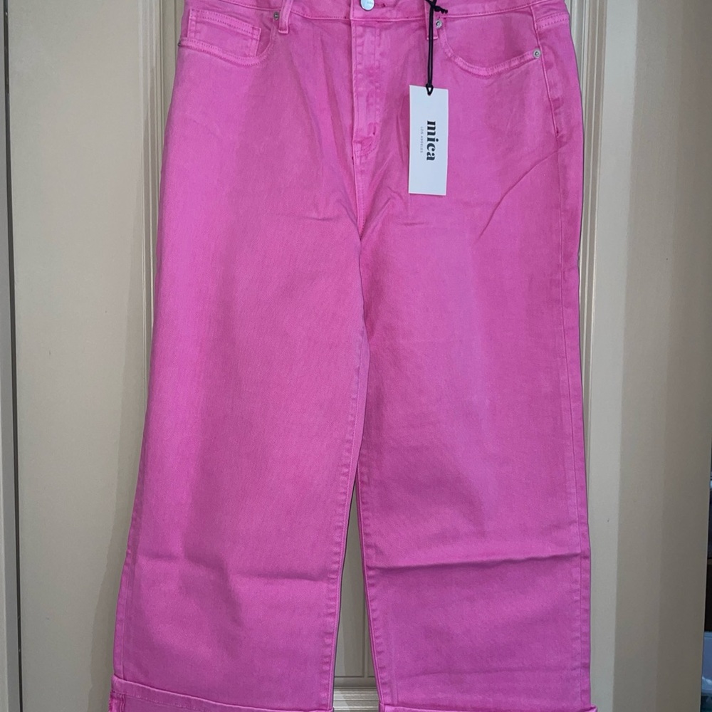 Vibrant Pink Flare Jeans by [Brand]